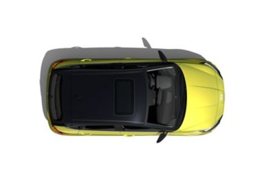 De Hyundai i20 in Lucid Lime Metallic met een Phantom Black dak, rechter zijaanzicht.