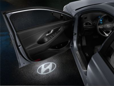 The LED door projector Hyundai logo for the i30 Fastback by Hyundai Genuine Accessories.