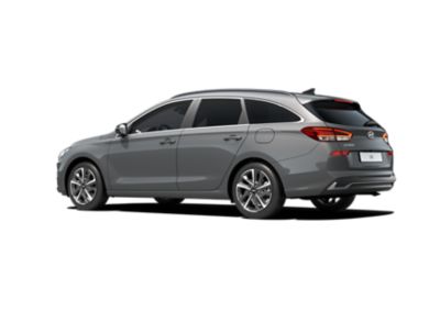 Cut-out of the new Hyundai i30 Wagon in grey, rear three-quarters view on white background.