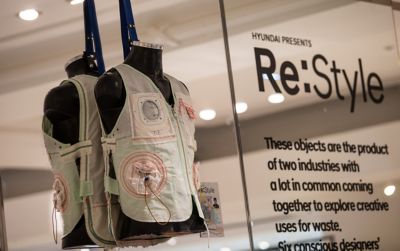 The Hyundai Re:Style clothes made from recycled car parts exhibited at a boutique.