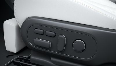 Details of the controls for the fully reclining front seats of the Hyundai IONIQ 5 electric midsize CUV.