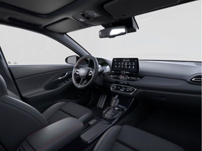 Die sportliche Innenausstattung des i30 N Line, in schwarz mit roten Ziehrnähten auf Polstern, am Schaltknüppel sowie am Lenkrad.