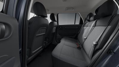 Centre console of the Hyundai INSTER small electric vehicle wireless charging dock.