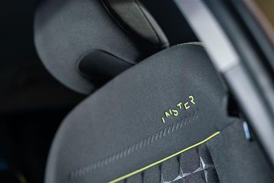 Centre console of the Hyundai INSTER small electric vehicle wireless charging dock.