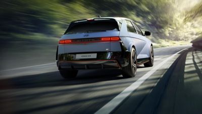 Rear view of the all-electric Hyundai IONIQ 5 N on a country road.