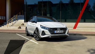 The Hyundai i30 N Line from the front parked in a parking lot.