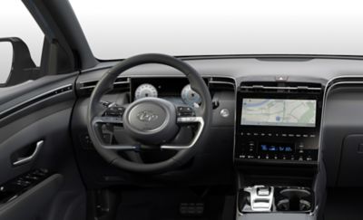 Interior view of the Hyundai Tucson Hybrid compact SUV showing its steering wheel.	
