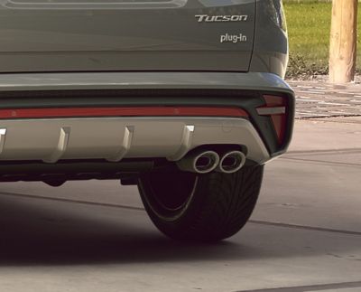 Detail of the Hyundai TUCSON Plug-in Hybrid N Line twin tip muffler exhausts.