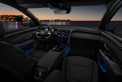 The interior design of the all-new Hyundai Tucson Hybrid compact SUV with its ambient LED lighting. 