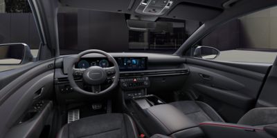 Hyundai TUCSON N line interior facing steering wheel.