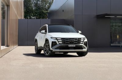 Hyundai TUCSON 20th Anniversary Edition with Pine Green Matte exterior colour from the front.