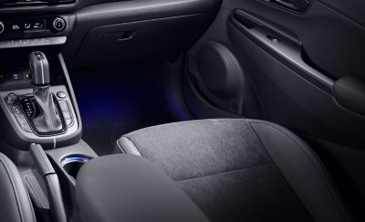 Ambient light in the footwell and centre console inside a Hyundai KONA N