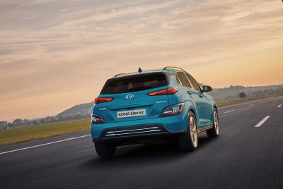 The Hyundai Kona Electric driving on the road