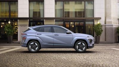 The Hyundai Kona Electric on the road.