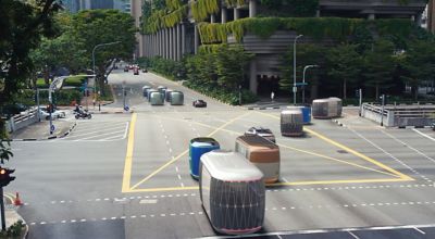 Hyundai Purpose Built Vehicles driving together in formation in a city.