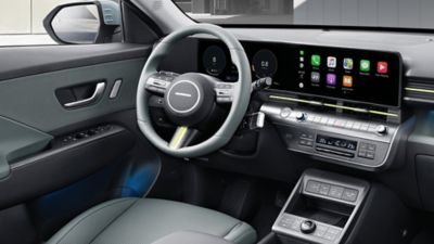 Apple CarPlay on the centre touch screen inside the Hyundai KONA SUV. 
