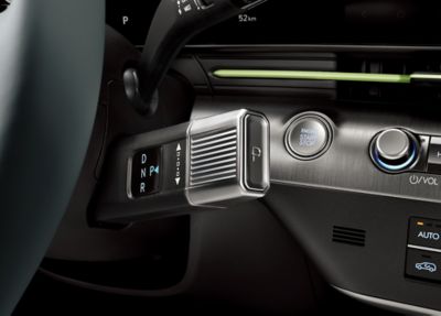 Picture of the shift-by-wire controller on the steering column of the Hyundai Kona.