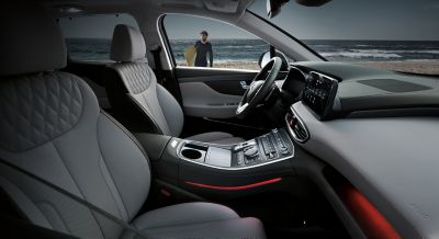 Interior view of the Hyundai Santa Fe Plug-in Hybrid 7 seat SUV showing the cockpit. 