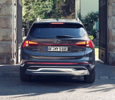 The Plug-in Hybrid badge on the Hyundai Santa Fe Plug-in Hybrid 7 seat SUV.