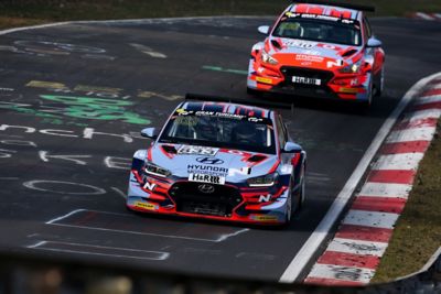 Hyundai teams competing in a TCR race.