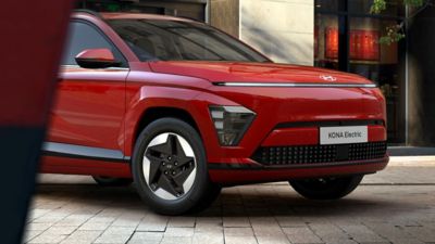 The Hyundai KONA Electric in red.