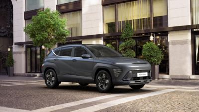 The Hyundai all-new KONA Hybrid driving in the city