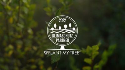 PLANT-MY-TREE® Logo mit dem Hinweis “Klimaschutzpartner 2022”.