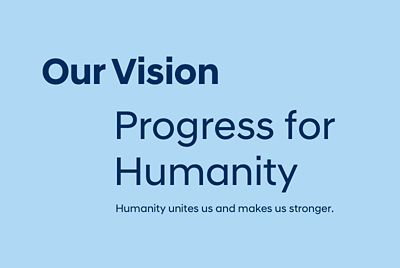 Schriftzug: Our Vision: Progress for humanity. Humanity unites us and makes us stronger.
