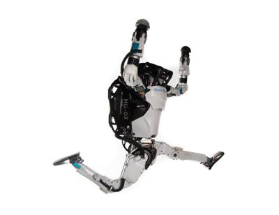 Zdjęcie robota Boston Dynamics skaczącego w powietrzu.