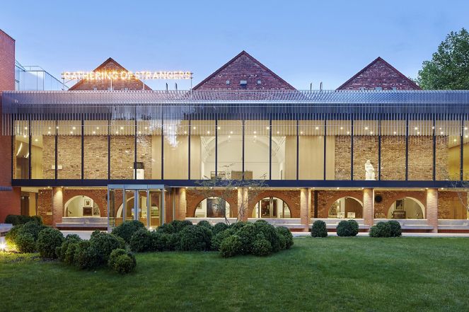 Image 3: Exterior image of the Whitworth, 'Gathering of Strangers' artwork by Nathan Coley (2007). Photograph by Alan Williams ⓒ the Whitworth, The University of Manchester