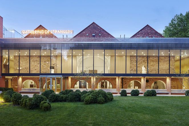 Image 3: Exterior image of the Whitworth, 'Gathering of Strangers' artwork by Nathan Coley (2007). Photograph by Alan Williams ⓒ the Whitworth, The University of Manchester