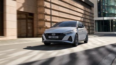The new Hyundai i20 N Line S in front of a building.