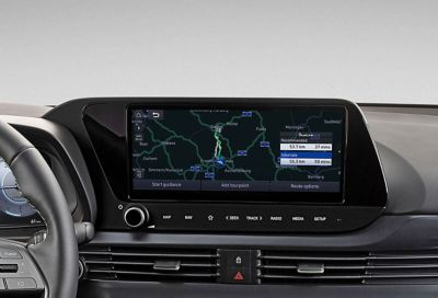 Close-up of the Hyundai i20 10.25" AVN touchscreen with navigation system on screen.