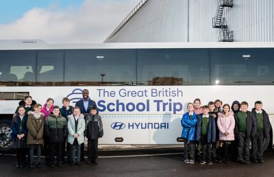 Schoolchildren in front of the GBST coach