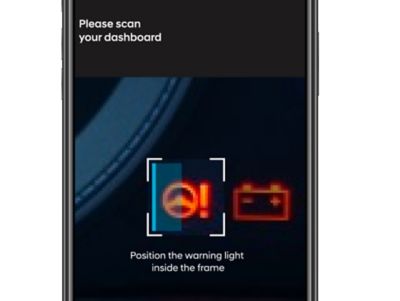 Using the myHyundai app to scan a warning light to get an explanation.