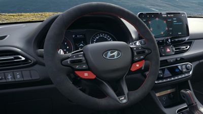 The Limited Edition steering wheel features red stitching and the superior grip of Alcantara and also comes with red buttons for N Mode and N Grin Shift.
