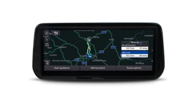 Close-up of the Hyundai Santa Fe Hybrid AVN touchscreen with navigation system on screen