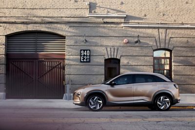 Hyundai NEXO Fuel Cell Electric Vehicle parked on a city street.