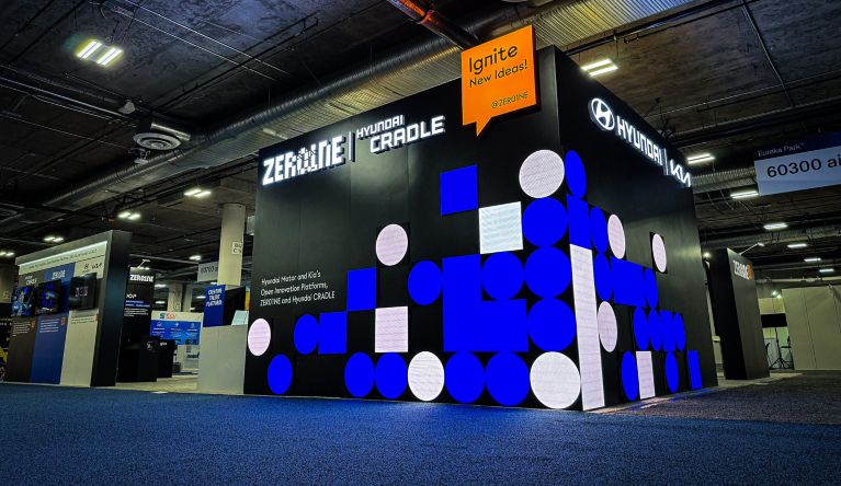 An exposition space advertising Hyundais start-up platforms ZERO1NE and CRADLE.