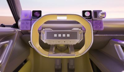 Hyundai Concept THREE interior with a rectangular steering wheel, digital displays, and purple-accented futuristic controls.