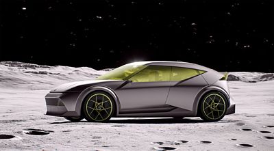 Hyundai Concept THREE on a cratered moon-like surface under a starry sky, with yellow-tinted windows and accented black wheels.