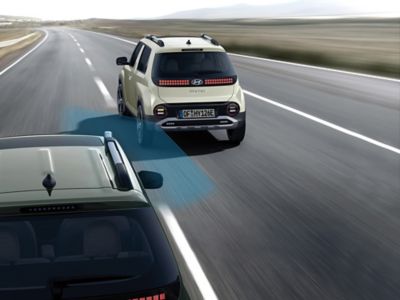 Représentation visuelle de l’un des angles morts du nouveau véhicule électrique compact Hyundai INSTER.