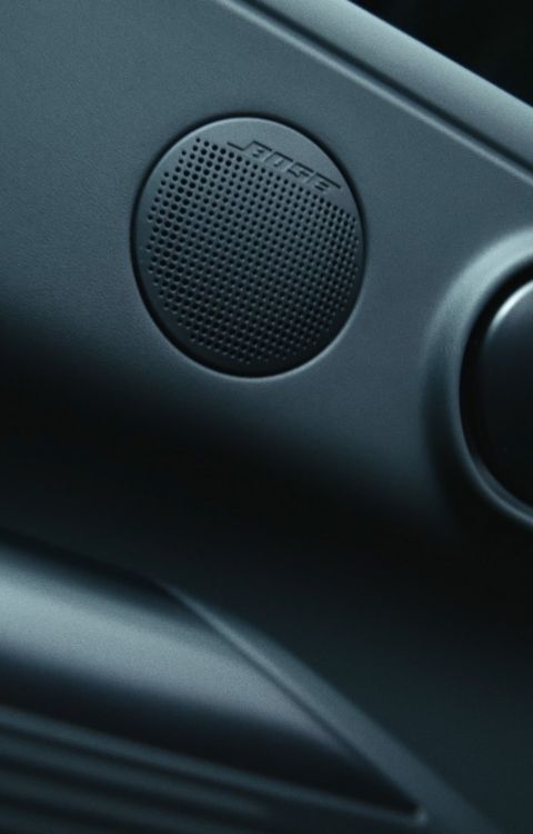 Hyundai IONIQ 3 door panel with integrated Bose speaker and interior handle detail