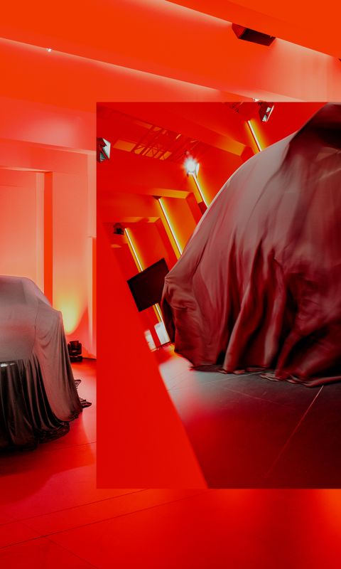 Covered Hyundai IONIQ 3 displayed within the Milan Design Week installation