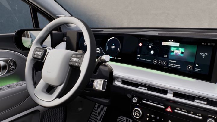 Hyundai IONIQ 9 interior showing steering wheel and wide digital display