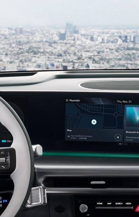 Hyundai IONIQ 9 featuring Music services on the curved display.