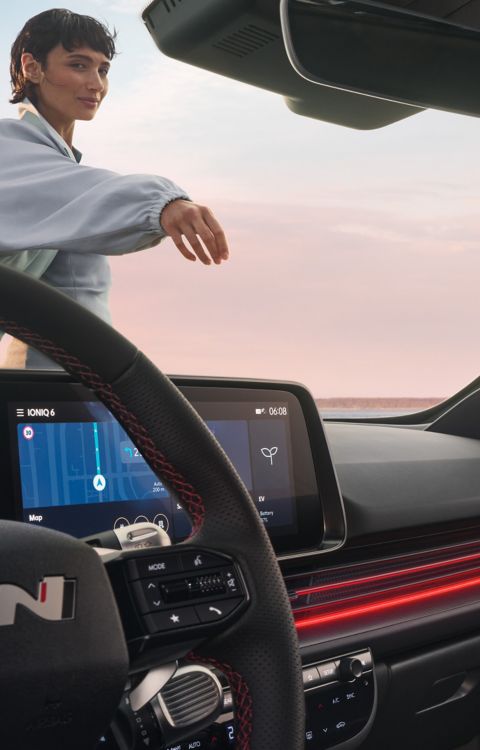 Sporty red accents inside the cockpit of the Hyundai IONIQ 6 N Line electric sedan.