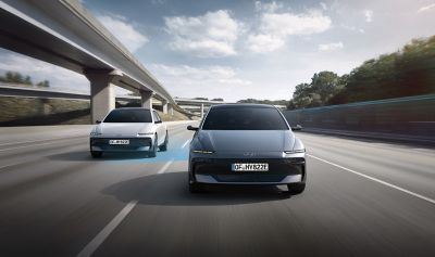 Two IONIQ 6 illustrating the sensors used in Highway Driving Assist 2 Level 2 autonomous driving.