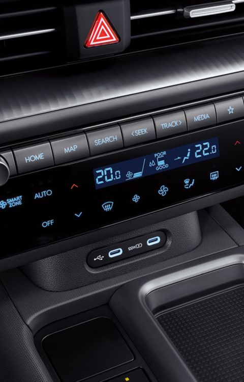 Close up image of the start button and air-conditioning control pad inside the Hyundai IONIQ 6.