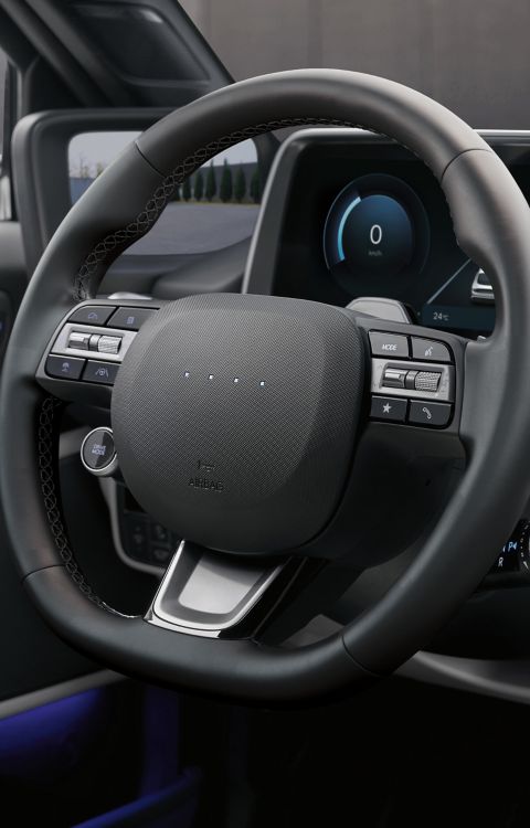 The interactive steering wheel inside the new Hyundai IONIQ 6 electric sedan.